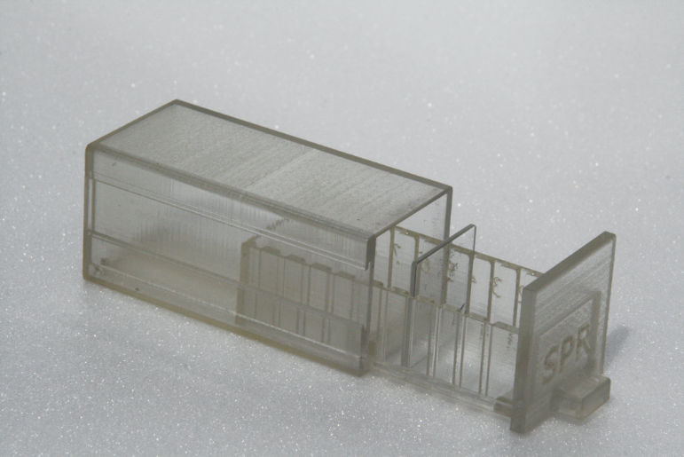 A 3D printed case for an ultrasonic transducer where precision is key to ensuring the microchip perfectly fits the case.