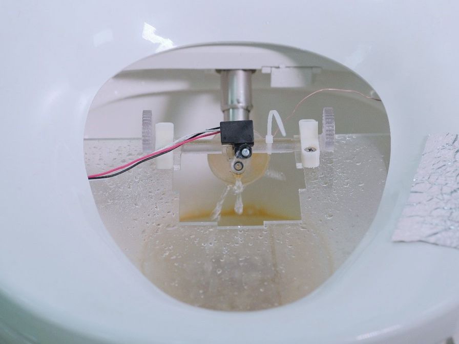 Transparent PolyJet VeroClear material lets Kohler engineers view water flow through this prototype part.