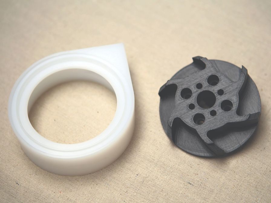 The 3D printed impeller prototype (black) works
with its PC mate to push an ice slurry through a
chilling system.