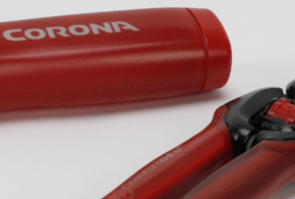 Corona lopper handle (left) and pruner prototype (right).