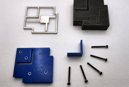 Exploded view of press mold for shield can frame