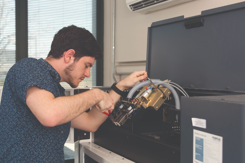 An engineering student works as a lab tech in the SMART
Lab at SUNY New Paltz.