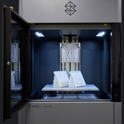 Neo800 with front door open after printing a Perform part.