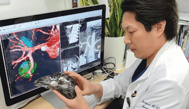 Dr. Maki Sugimoto displays a 3D printed organ.