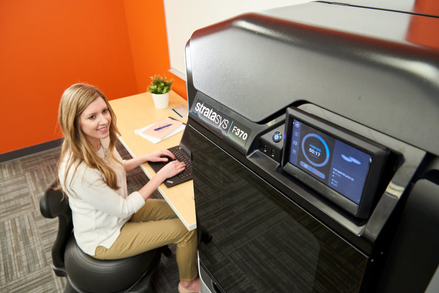 Employee using Stratasys F370 3D Printer