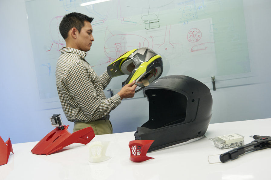 Engineers reviewing 3D printed prototype