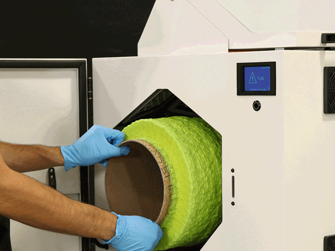 Loading WRAP Machine with Yellow Resin.