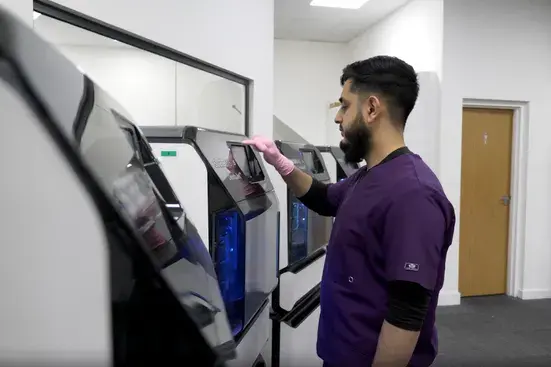 21D dental tech running Stratasys J5 DentaJet