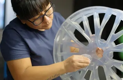 person holding 3d printed rim