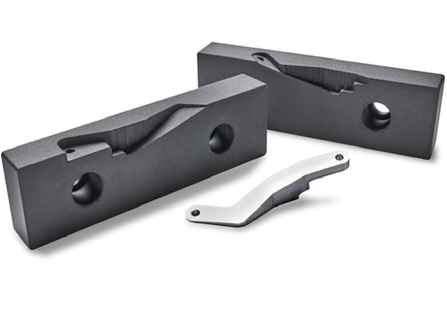 These soft jaws were 3D printed with FDM<sup>®</sup> Nylon-CF10, a composite nylon polymer.